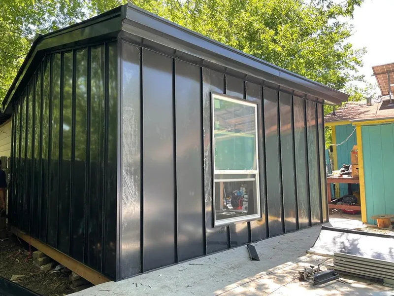 Black standing seam metal wall panels for Roof Inspection in Miami Gardens